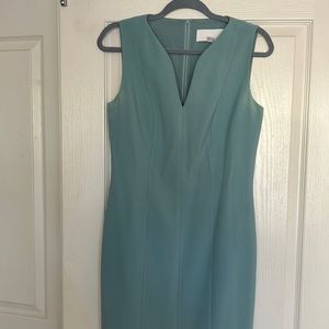 Designer sheath dress in a beautiful sage green. In like new condition.